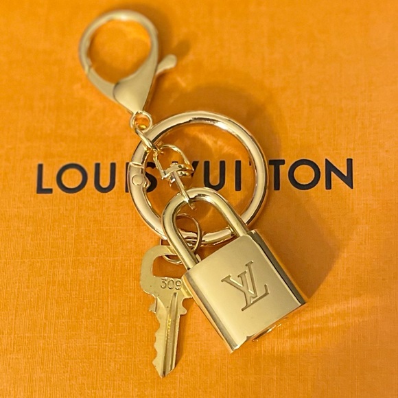 Louis Vuitton Accessories - Louis Vuitton 💯 authentic padlock & Key #309